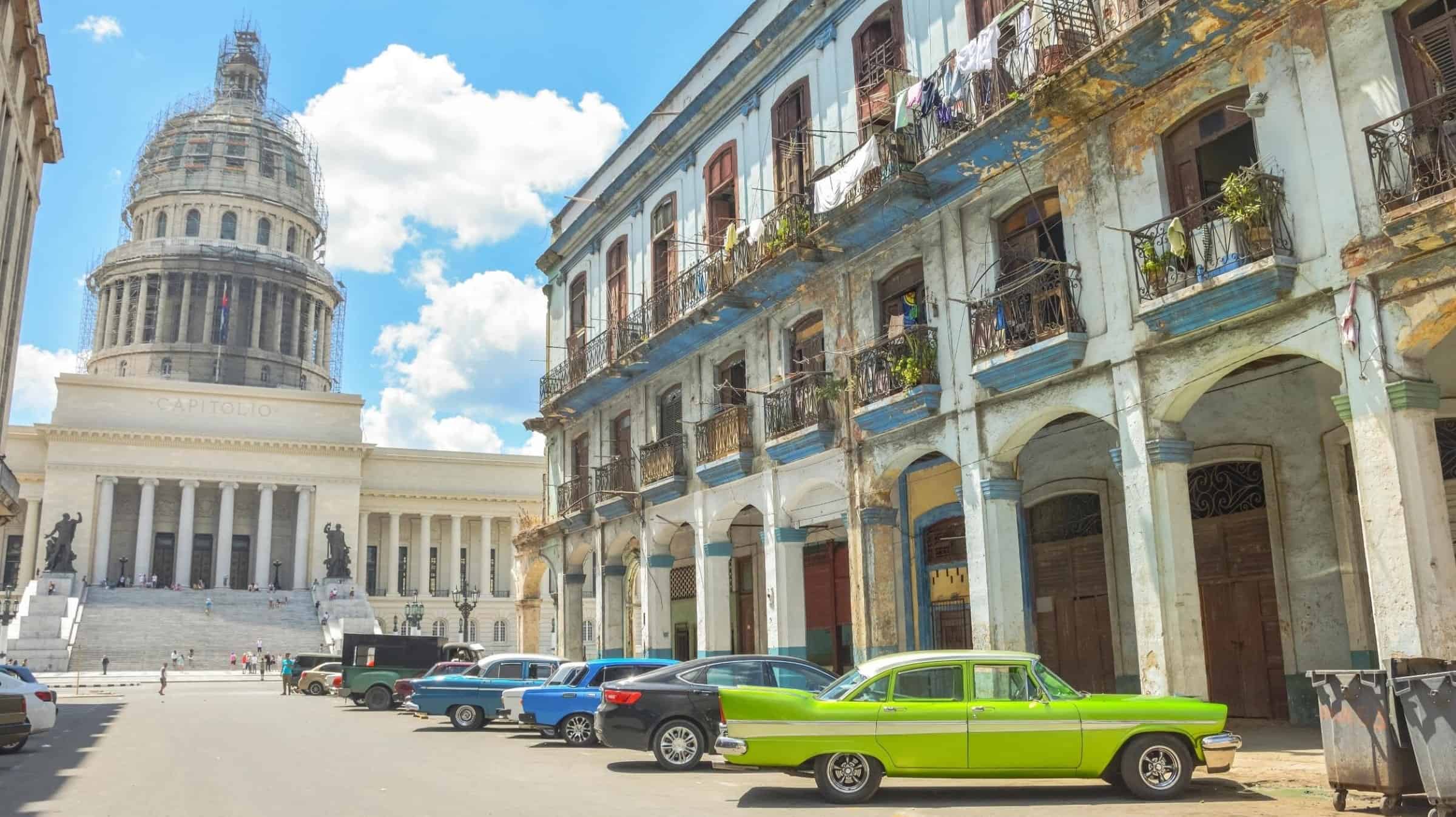 Old Havana street scene , Capitolio and Classic American cars 