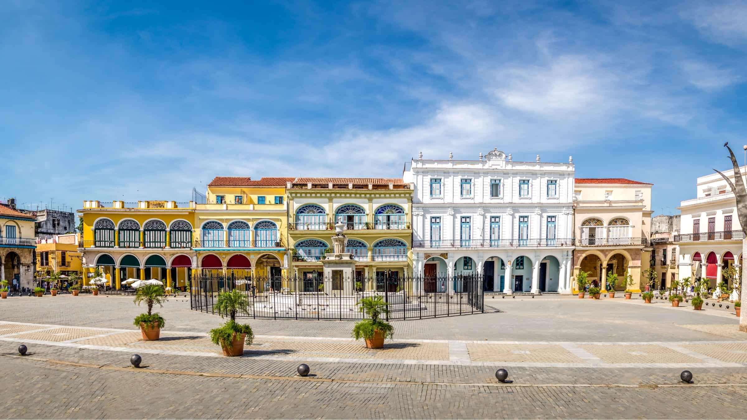Old Havana street scene , Plaza Vieja , pastel colonial houses 