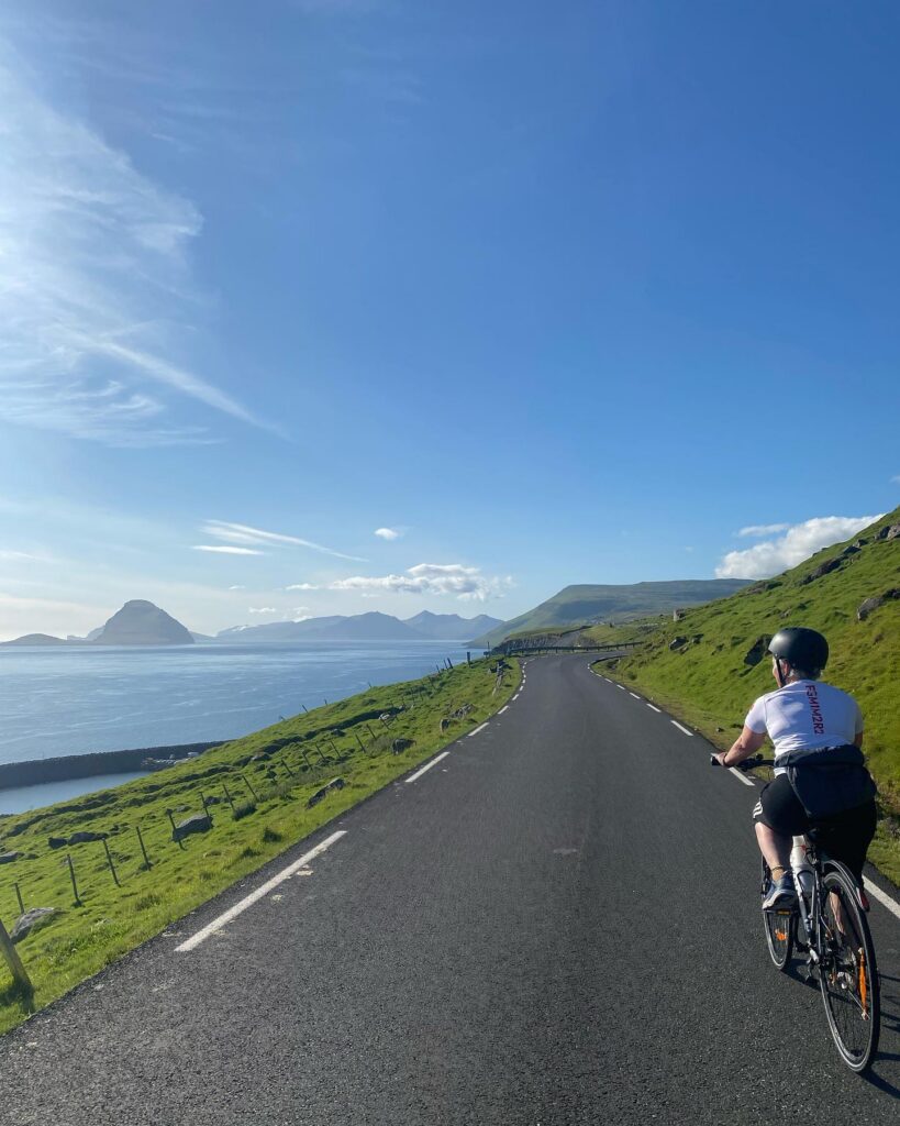 Sára's mom cycling in Faroe Islands